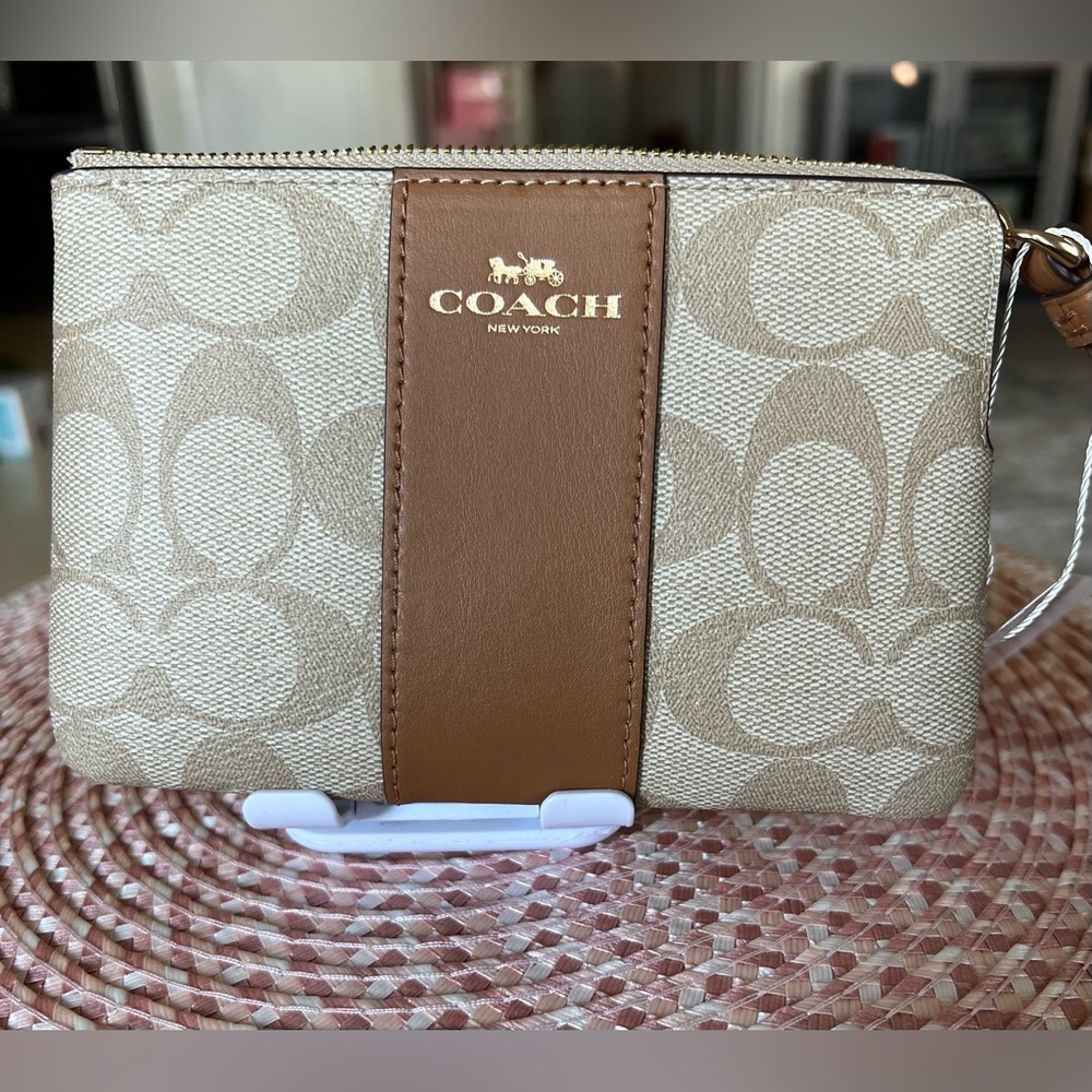 Coach Corner Zip Wristlet In Signature Canvas